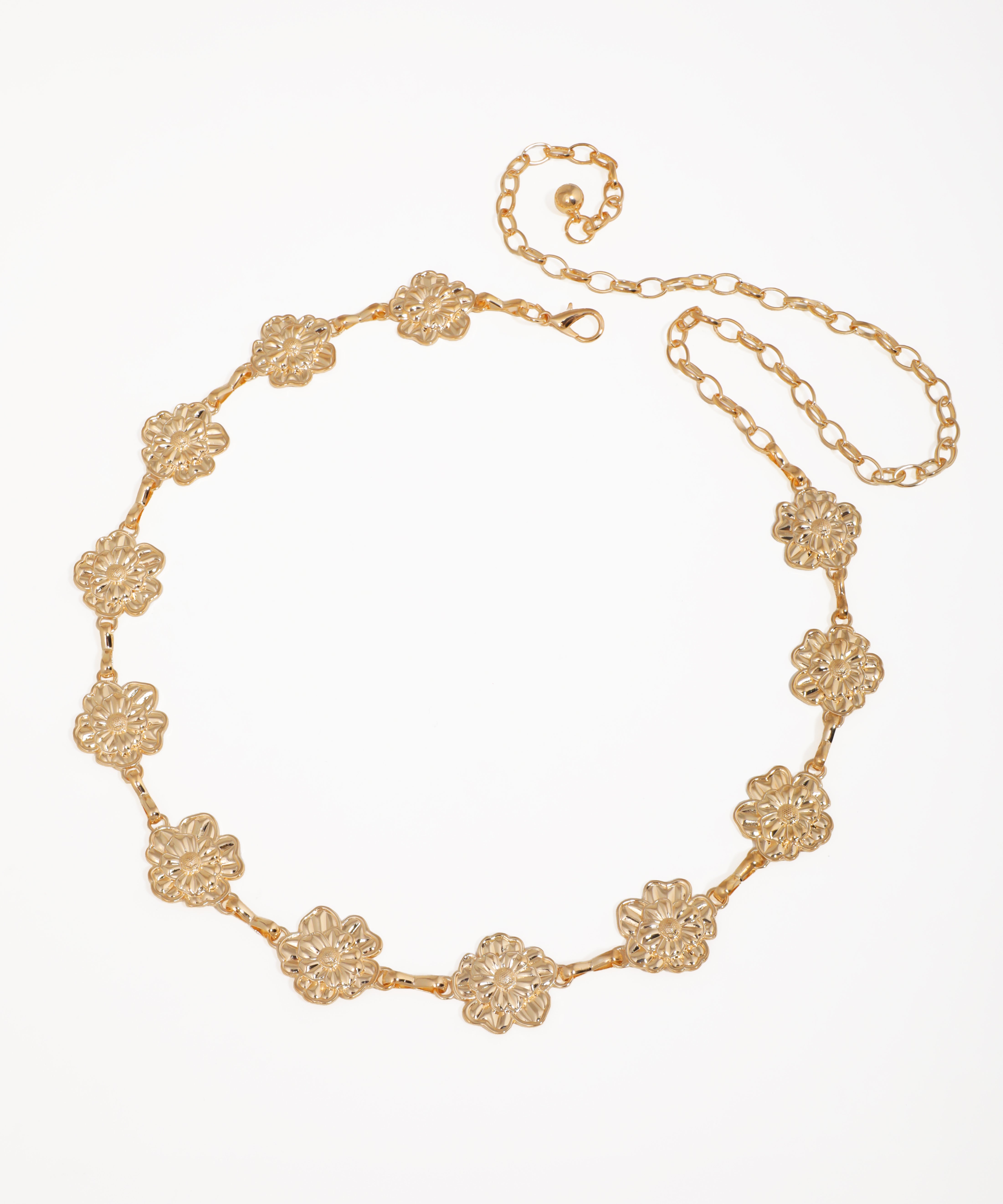 Gold-tone waist chains with delicate floral link pattern and adjustable chain closure