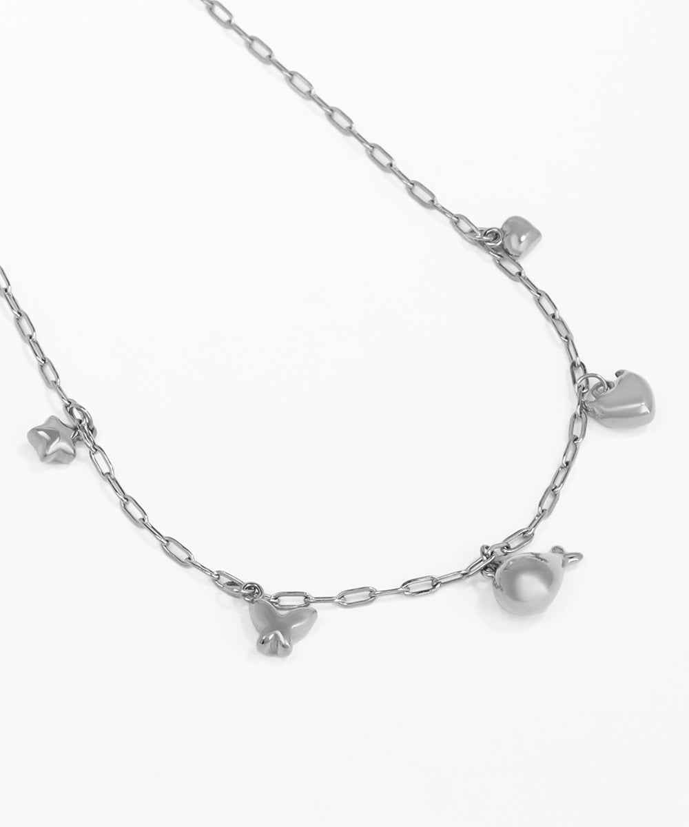 Silver necklace with heart-shaped pendants on a white background