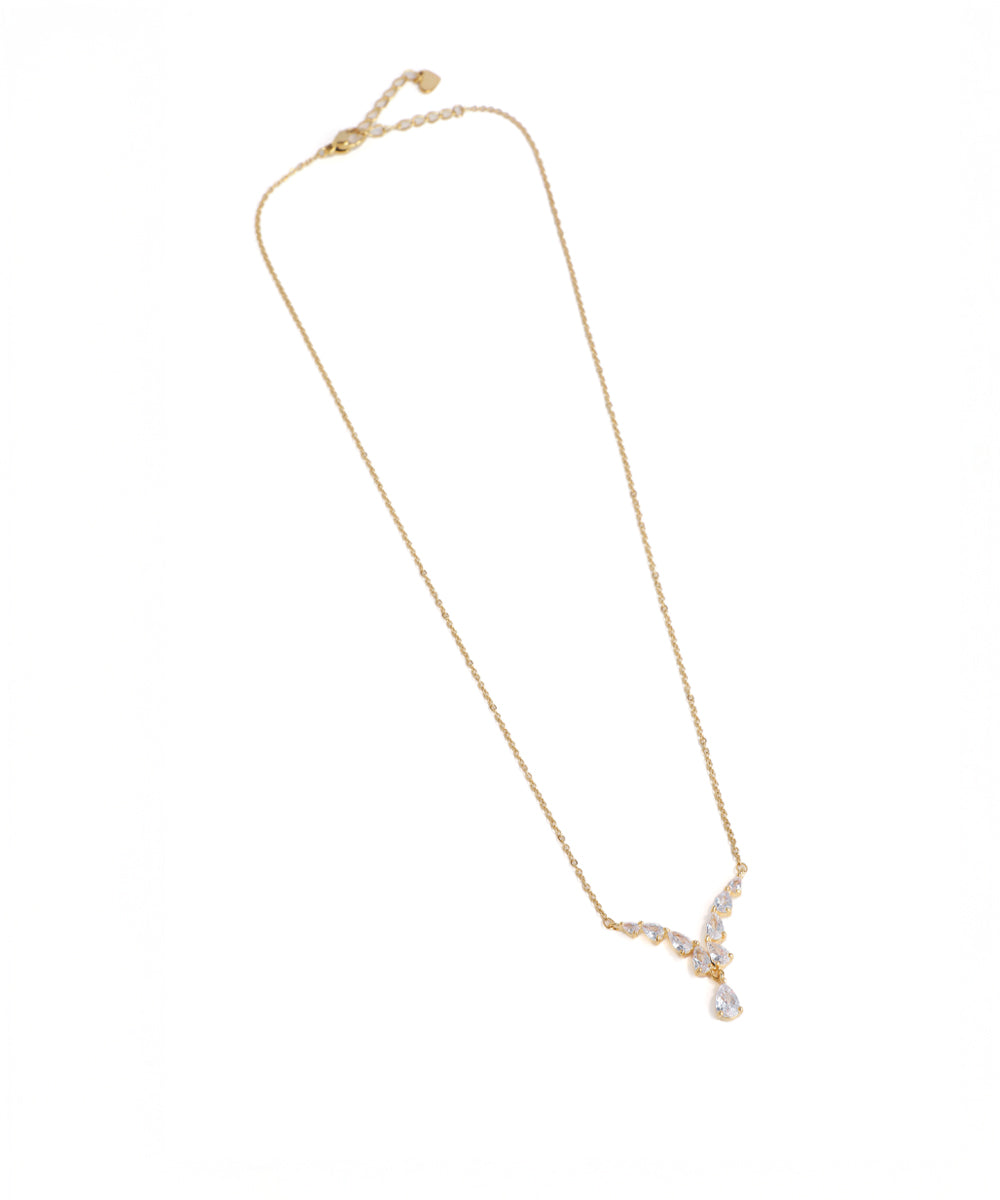 Gold necklace with a pendant on a white background