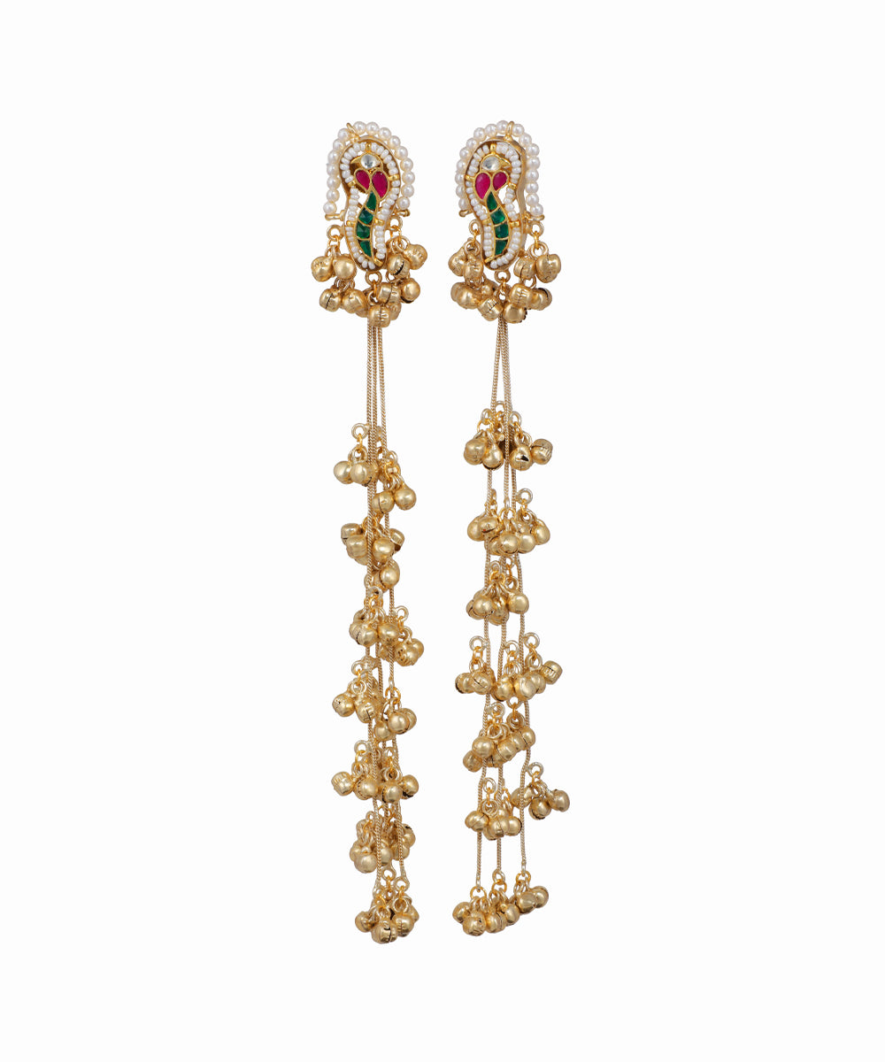 Pair of gold earrings with gemstones on a white background