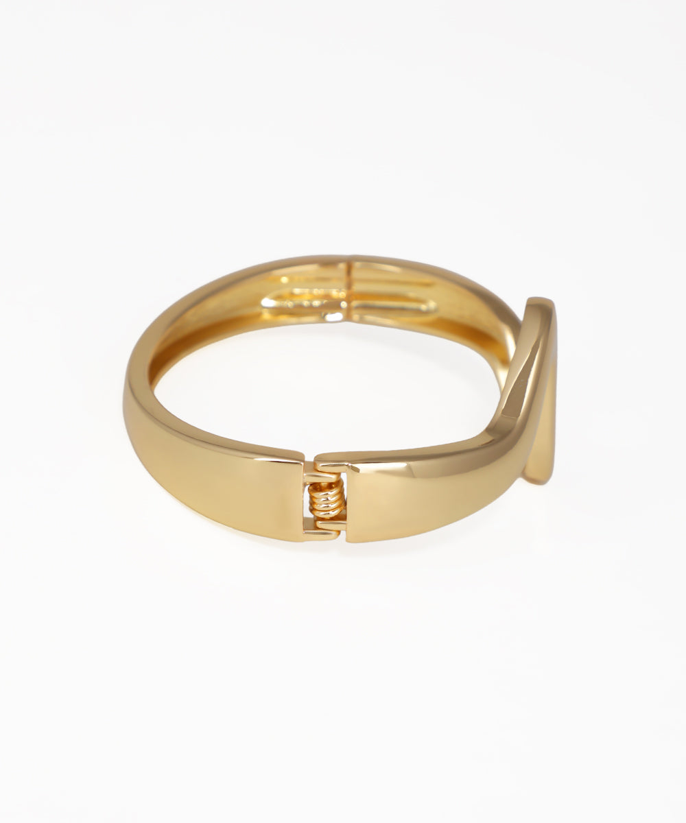 Gold ring on a white background