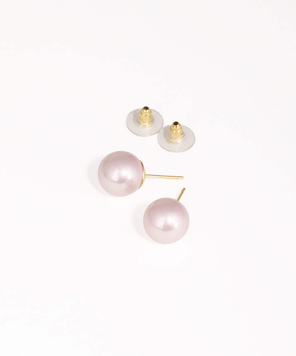 Pearl earrings with gold posts on a white background