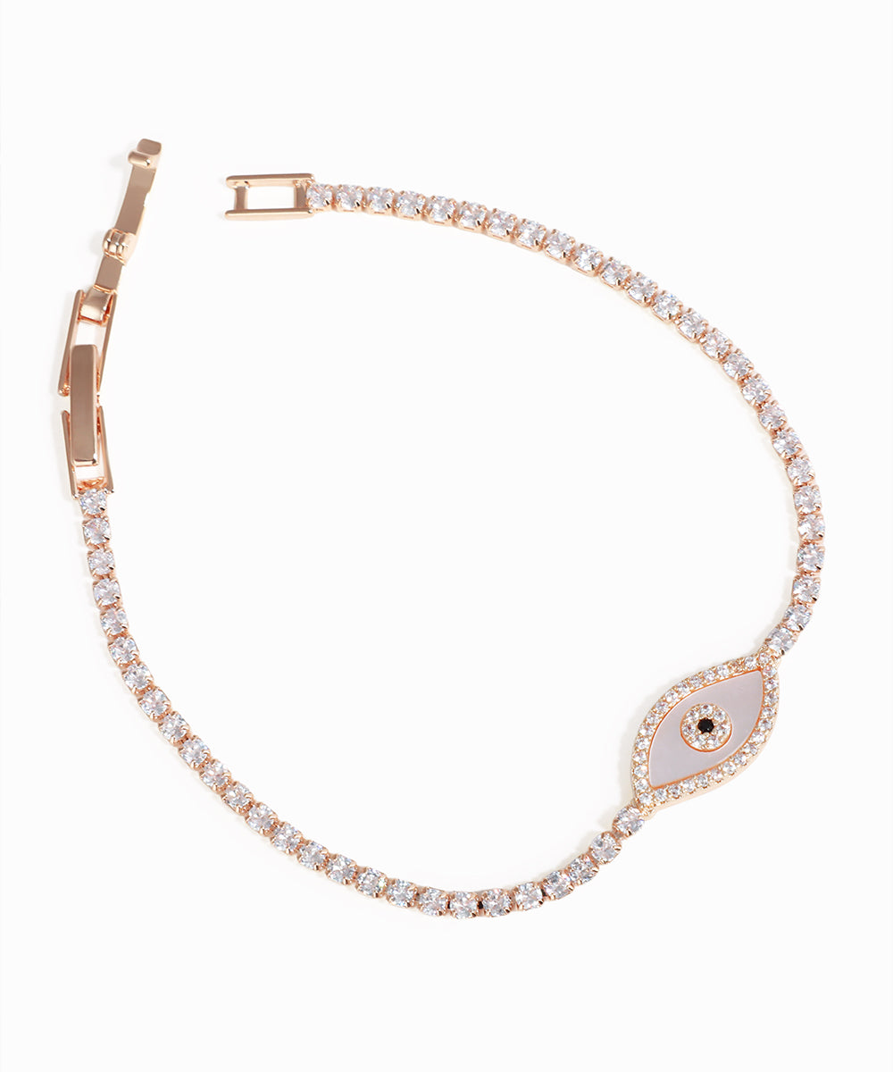 Rose gold bracelet with diamond accents on a white background