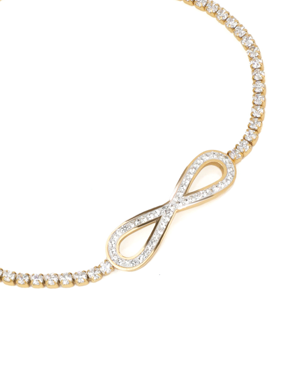 Gold bracelet with diamond infinity symbol on a white background