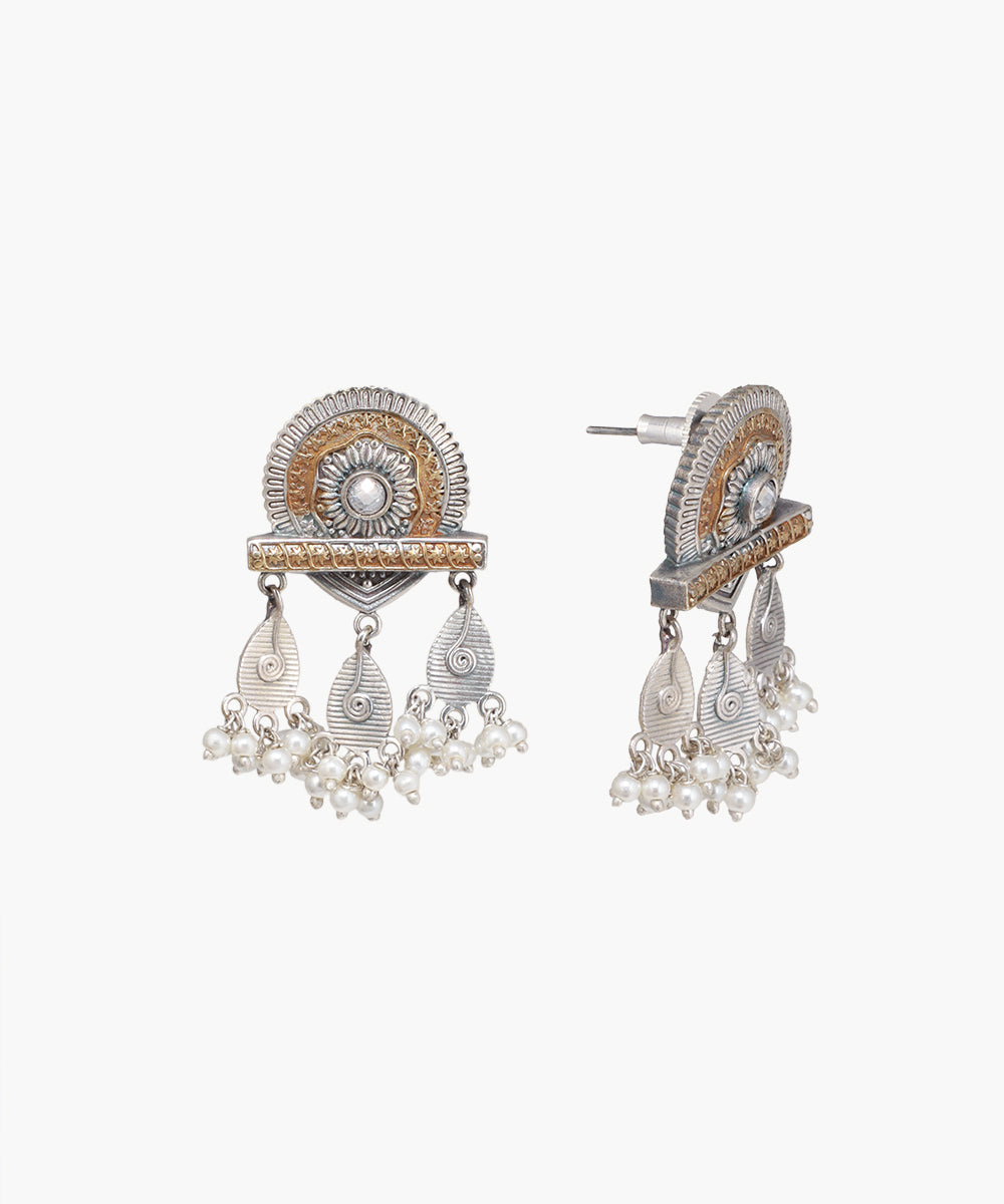 Dual-tone earrings with embossed circular stud, textured bar, teardrop drops, and clusters of faux pearls.