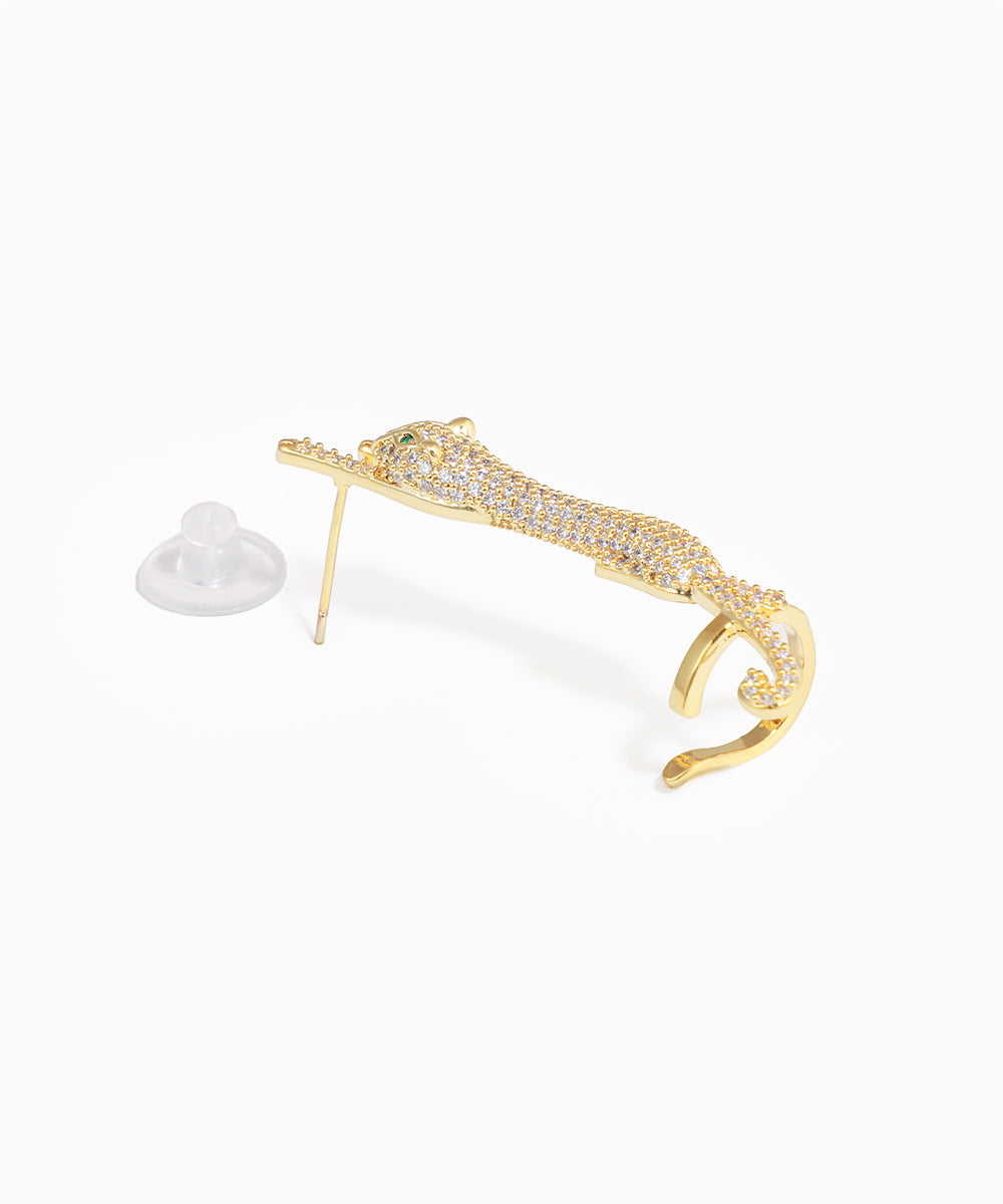 Gold-tone panther crawl earring with clear and green CZ stones, push back closure