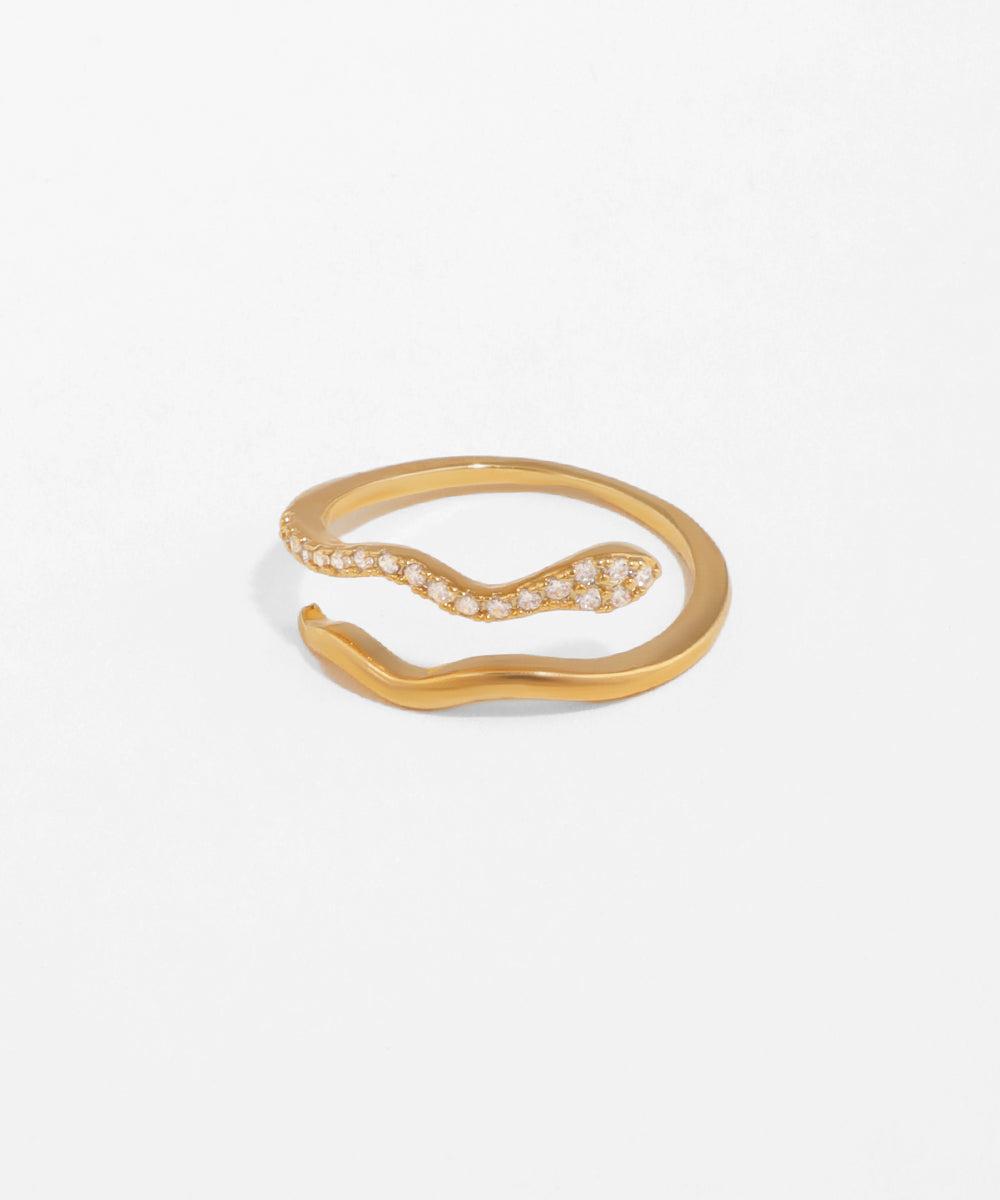 Gold ring with small diamonds on a white background