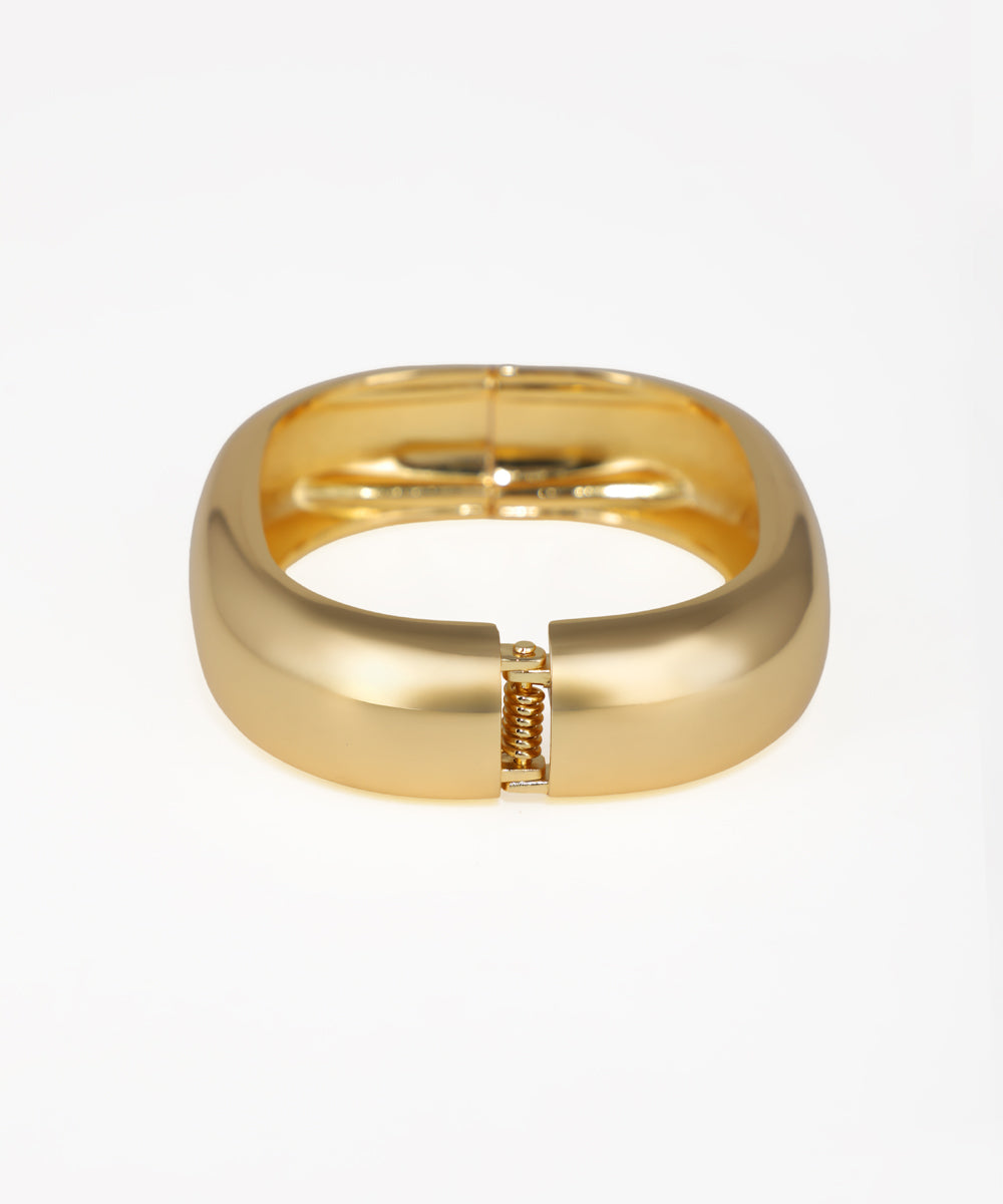 Gold ring on a white background