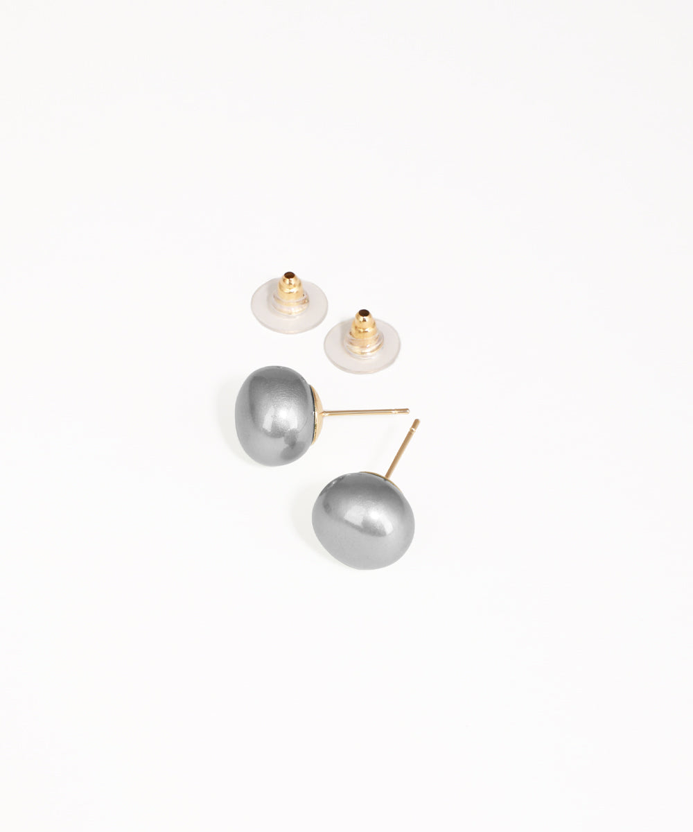 Pair of gray pearl earrings on a white background