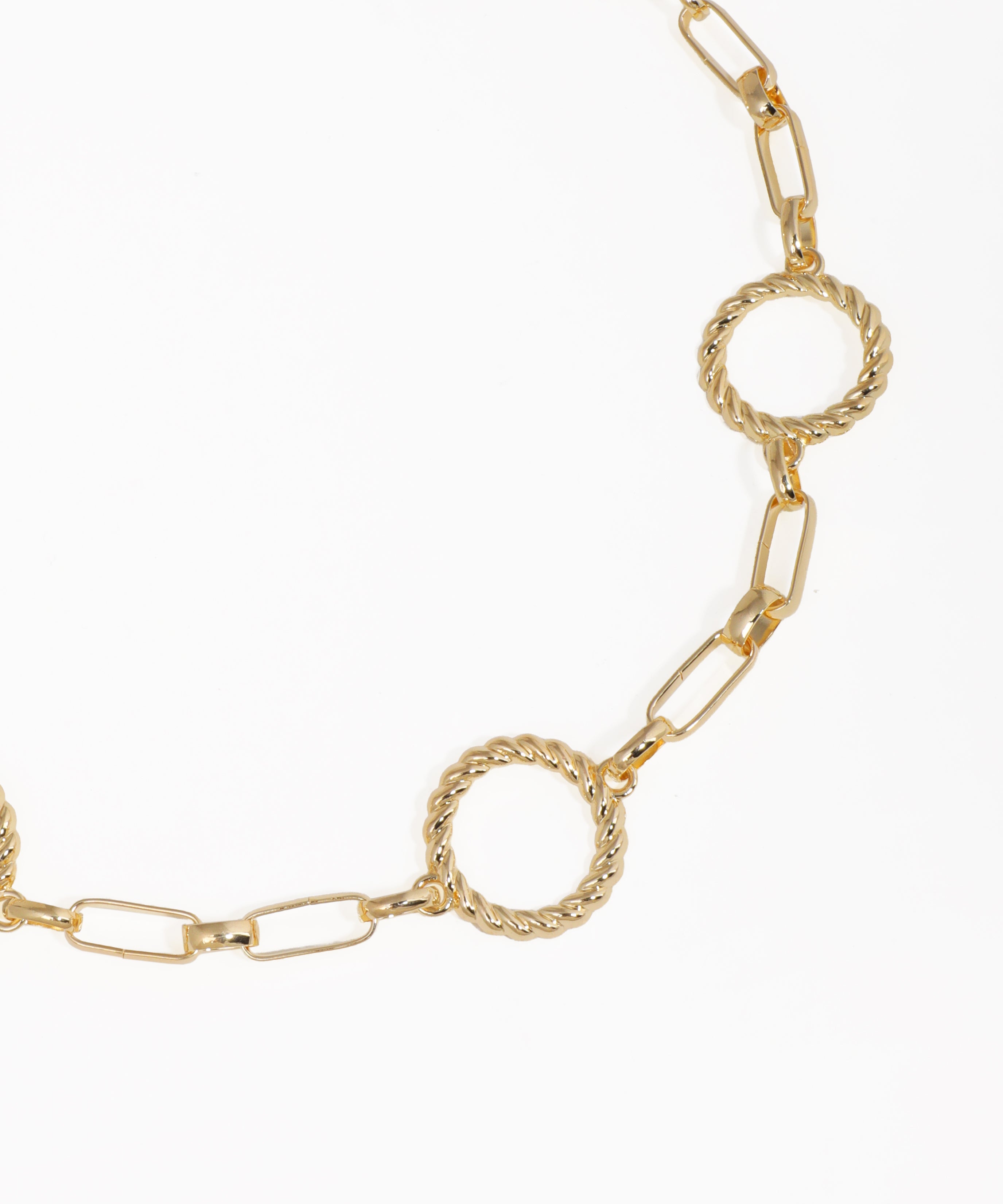 Gold chain necklace on a white background