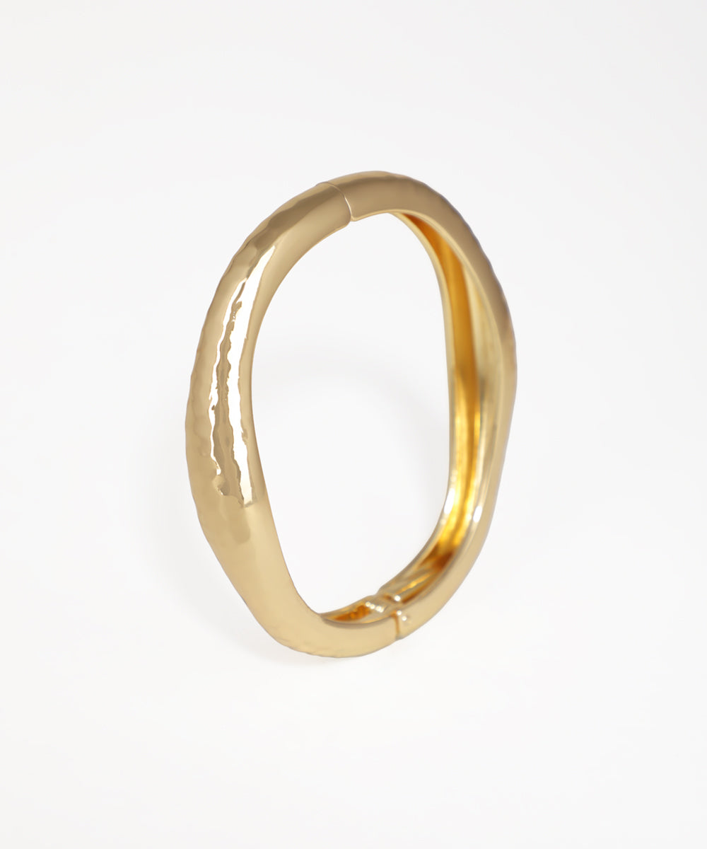 Gold ring on a white background