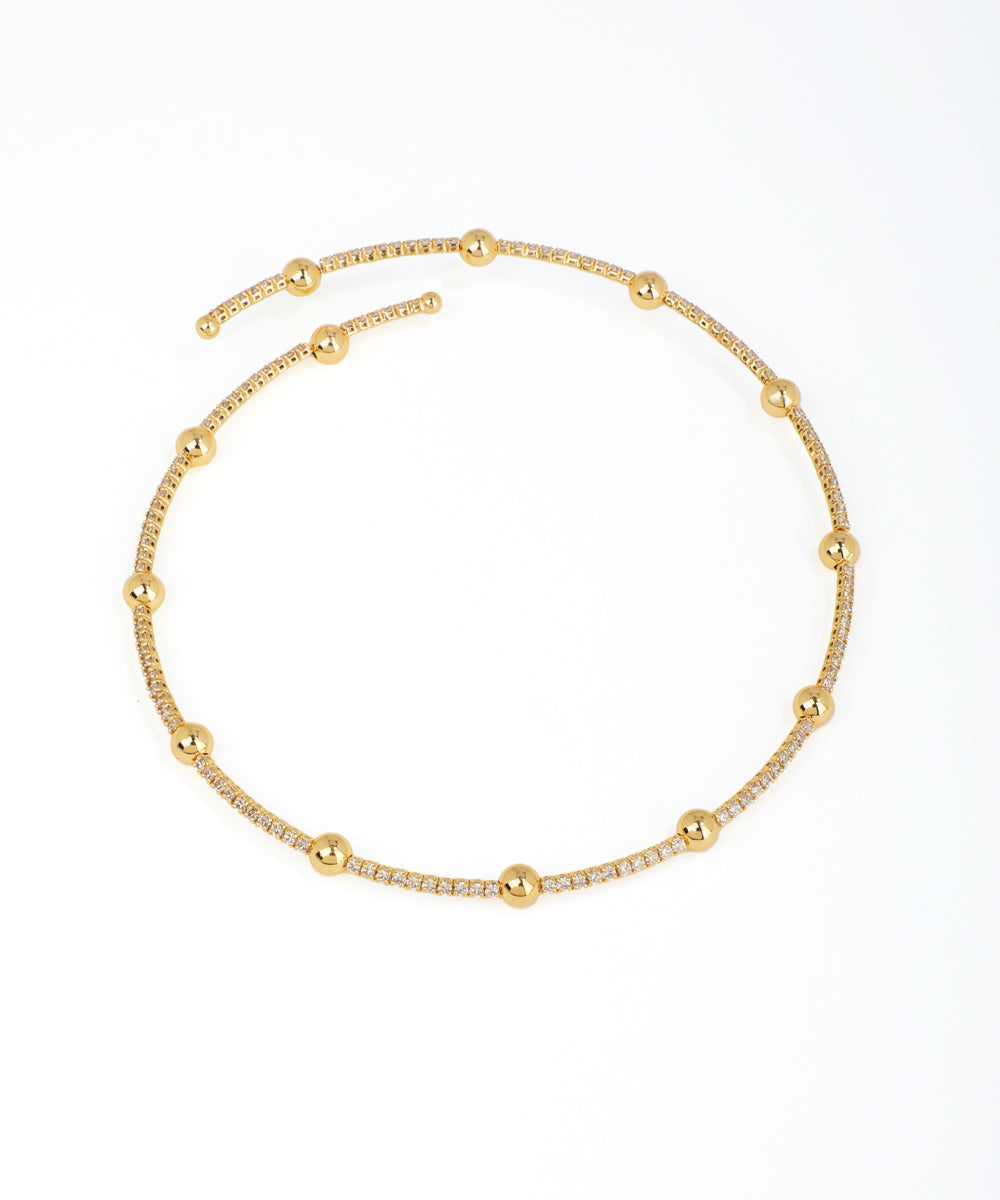 Gold-tone necklace with clear stone pavé and polished spherical beads