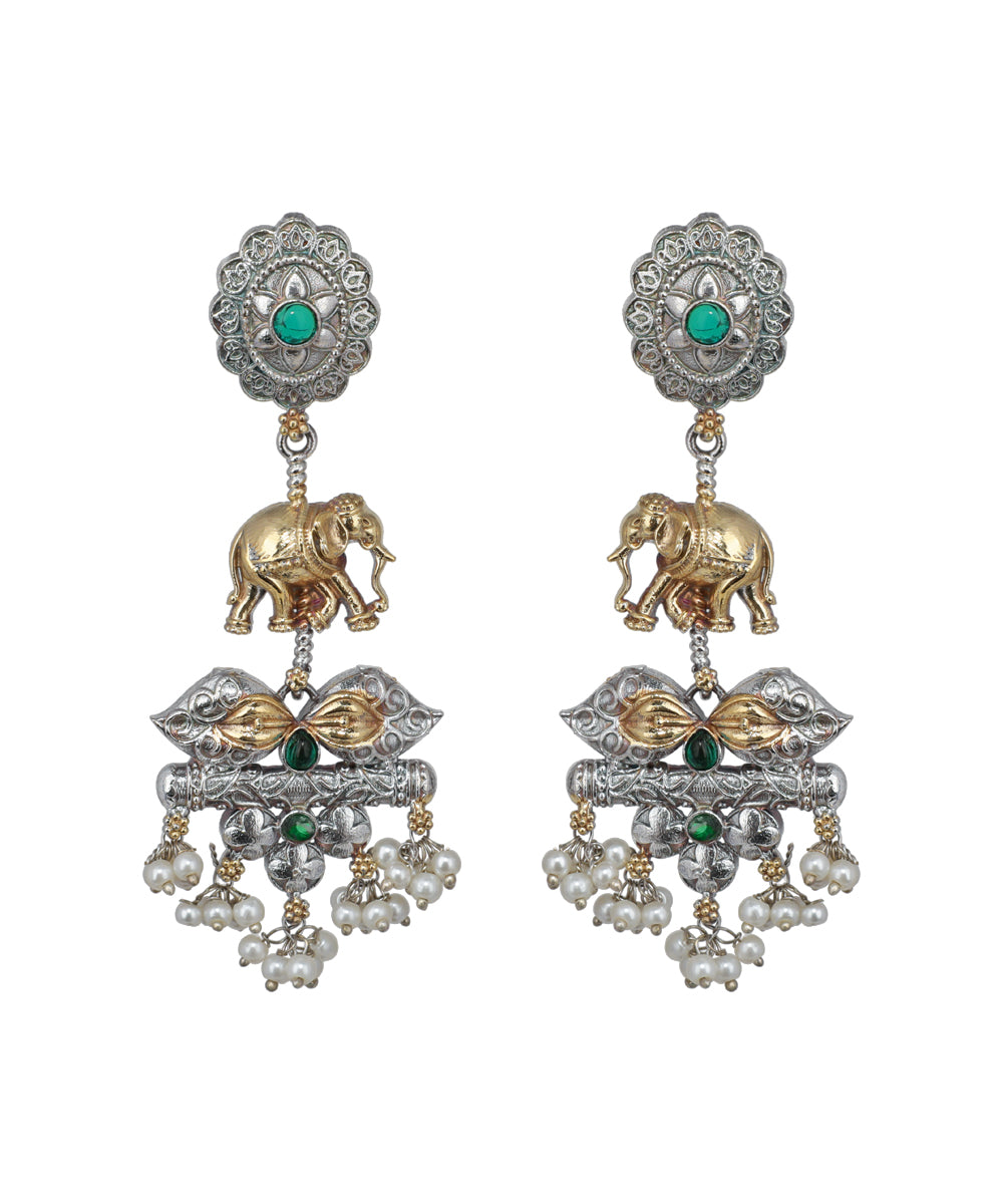 Ornate earrings with elephants, pearls, and green stones on a white background