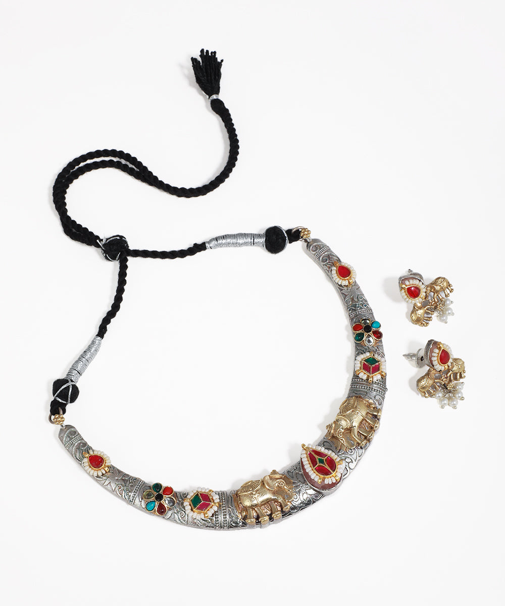 Oxidised silver-tone necklace set with gold-tone elephants and colorful glass crystals