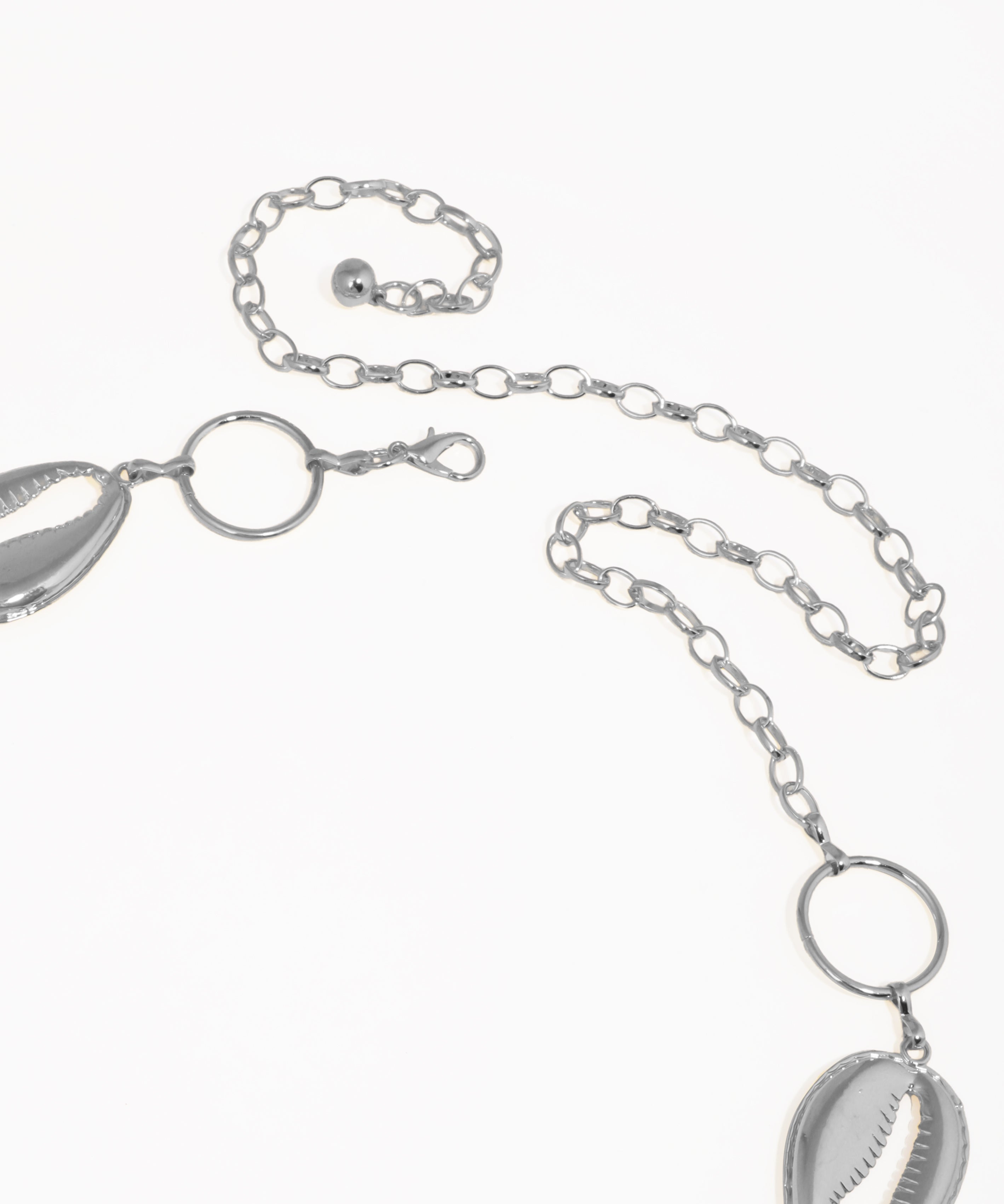 Silver chain with pendant on a white background