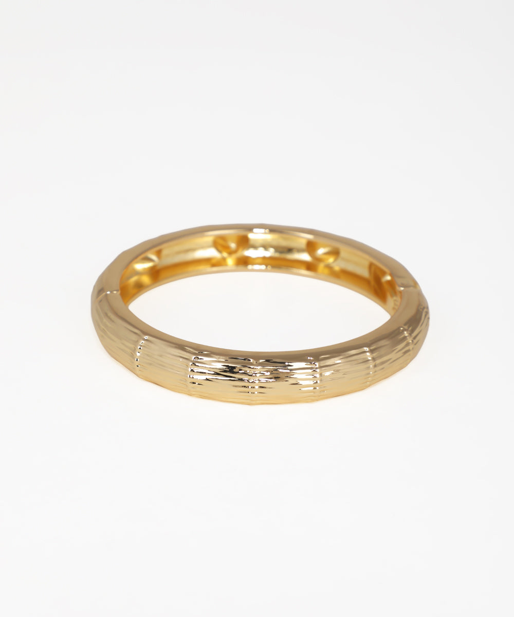 Gold-tone bangle kada with wide ribbed texture