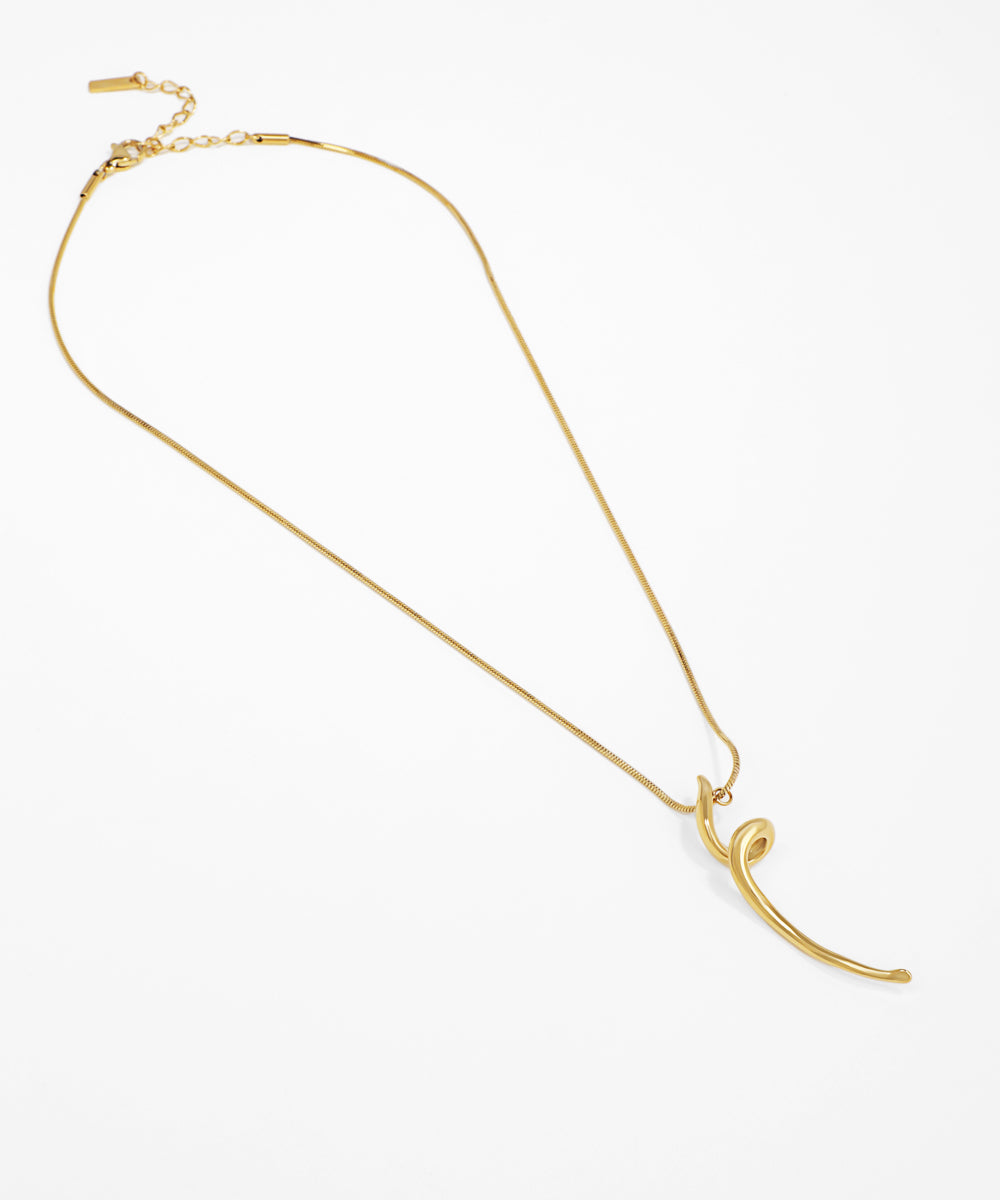 Gold necklace with a unique clasp design on a white background