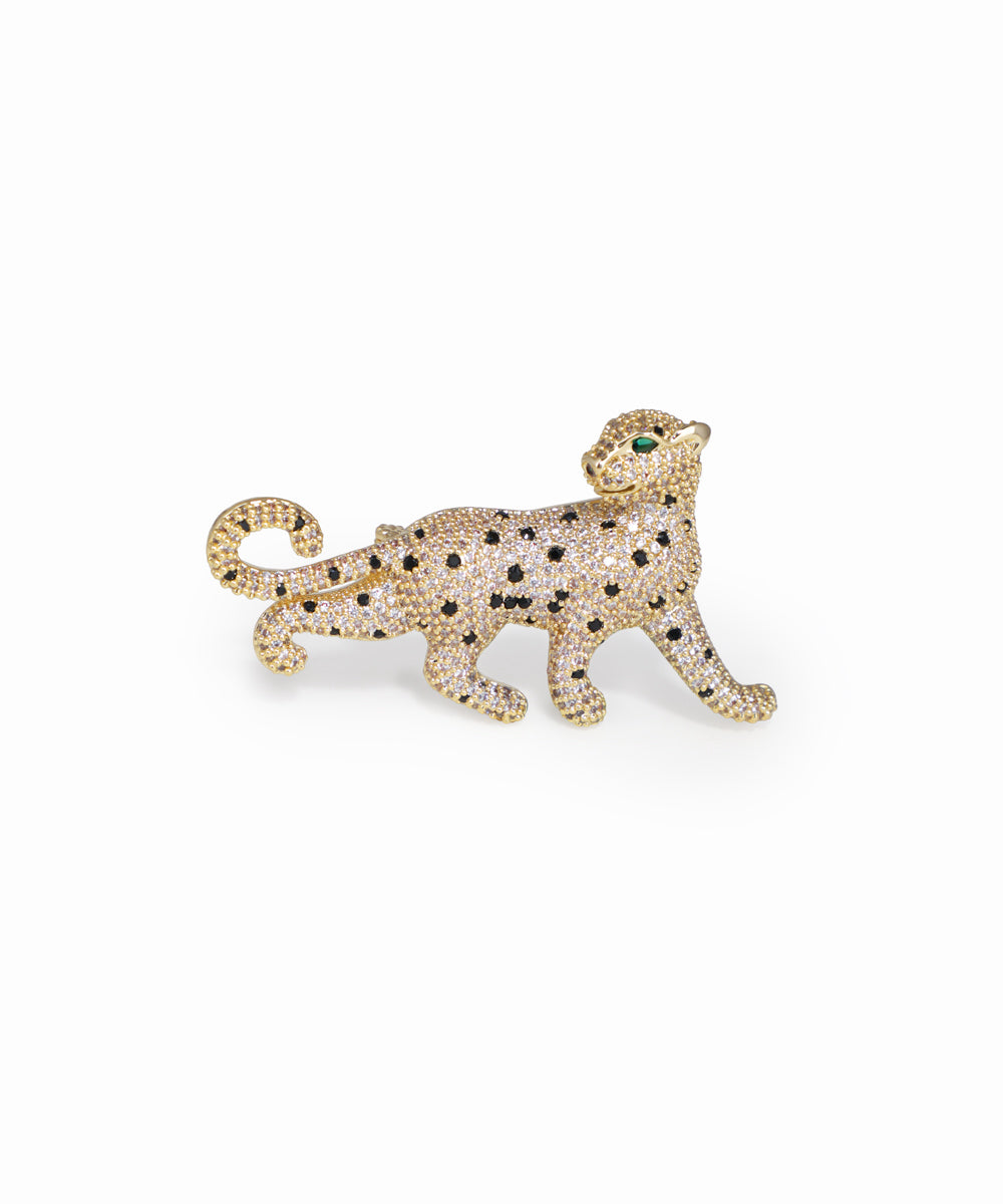 Gold-tone brooch pin with clear, black, and green CZ in a leopard design