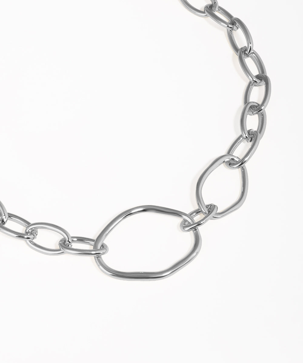 Silver chain necklace on a white background