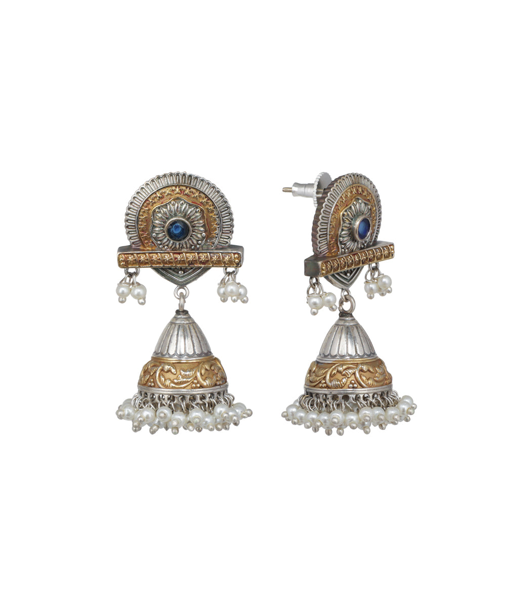 Oxidised and gold-tone floral jhumka earrings with blue glass stone and faux pearls