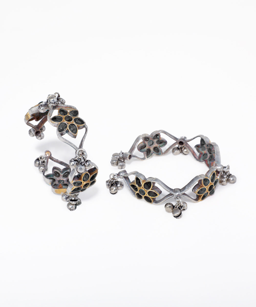 Pair of floral earrings on a white background