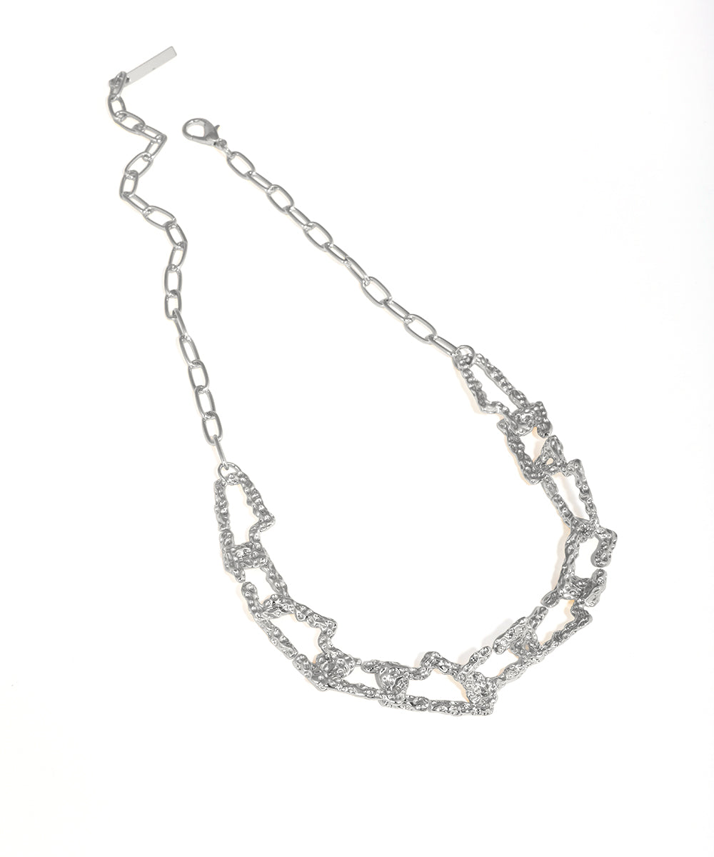 Silver chain necklace on a white background