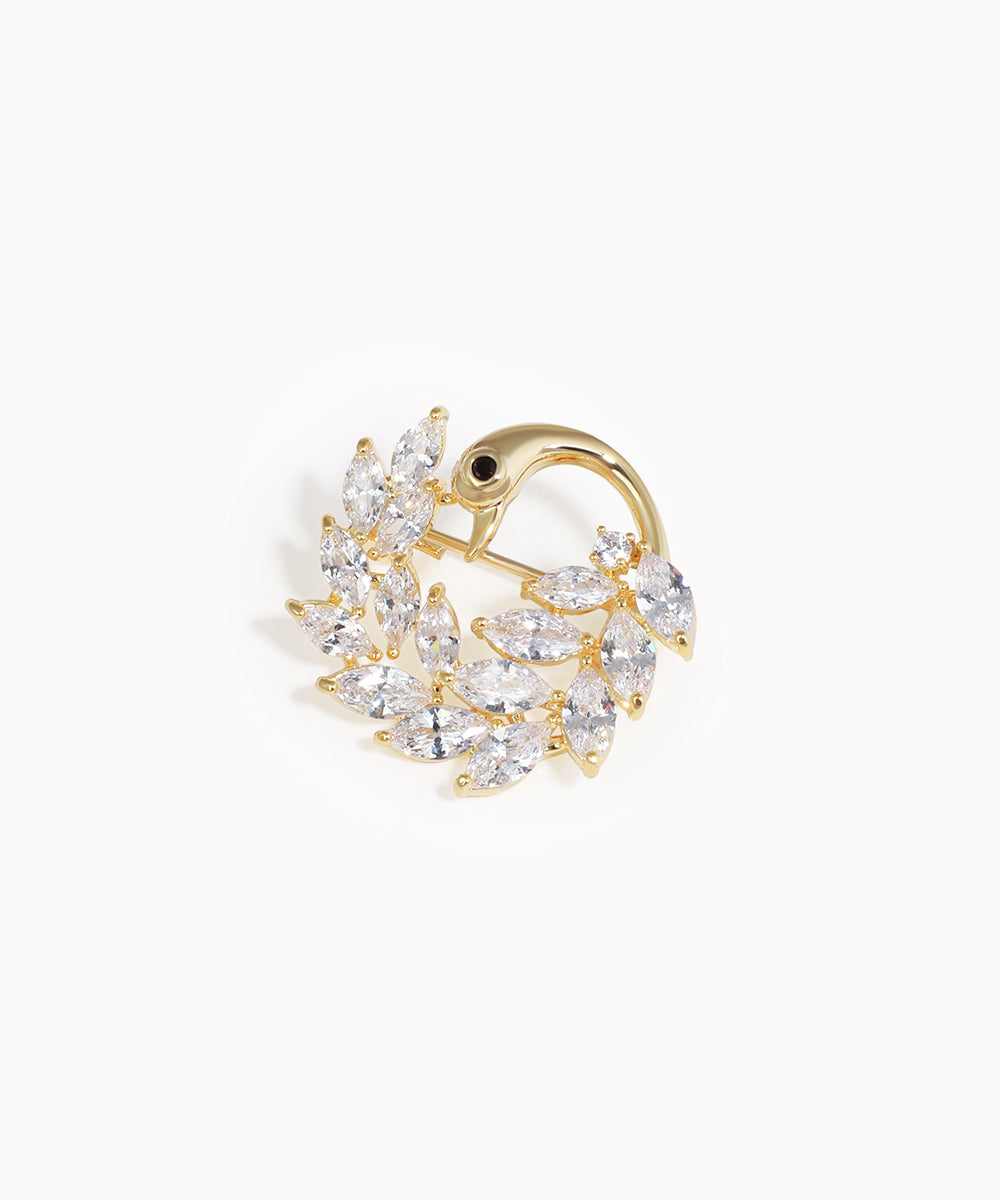 Gold-tone brooch with swan design and marquise clear stones