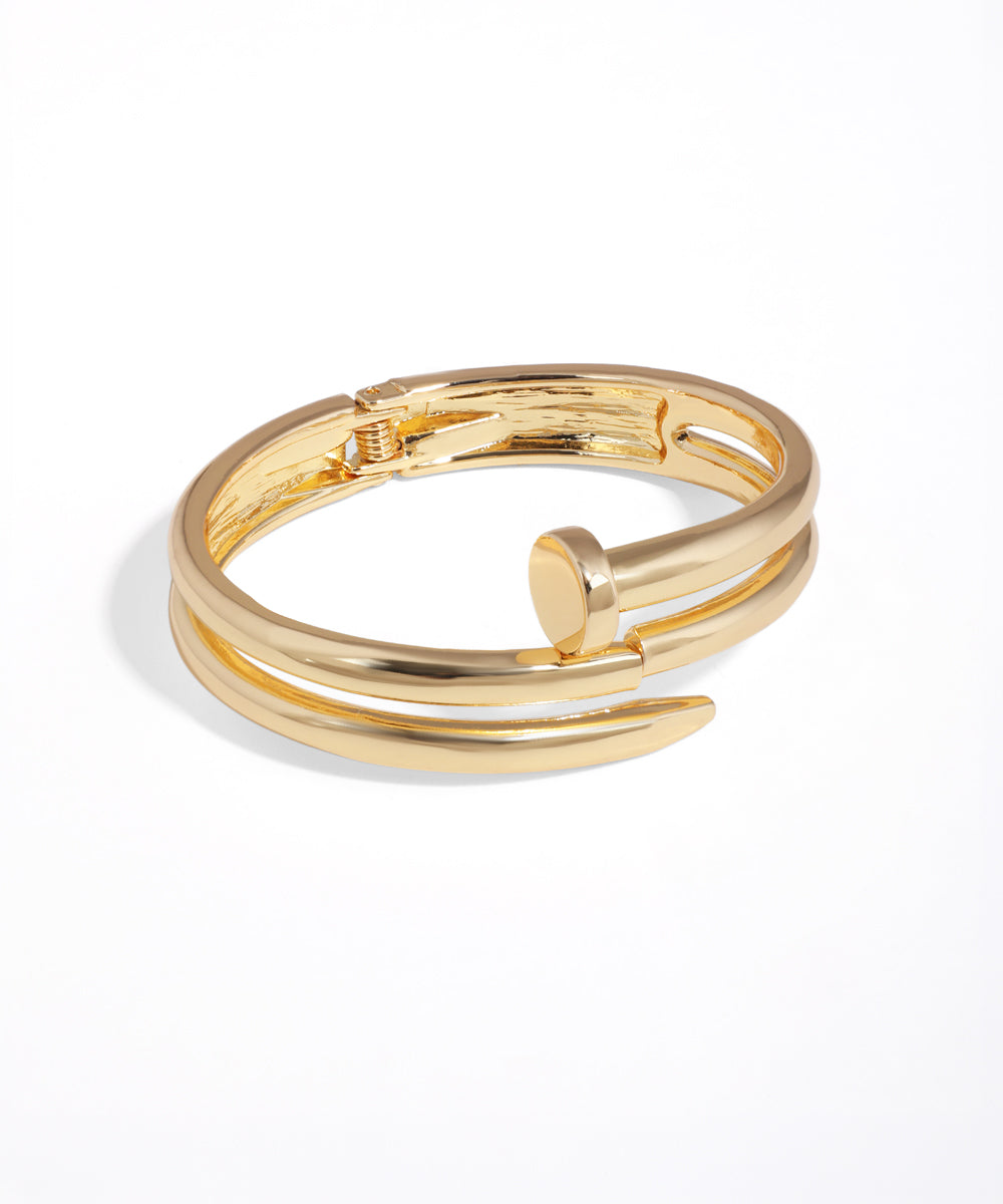 Gold bracelet on a white background