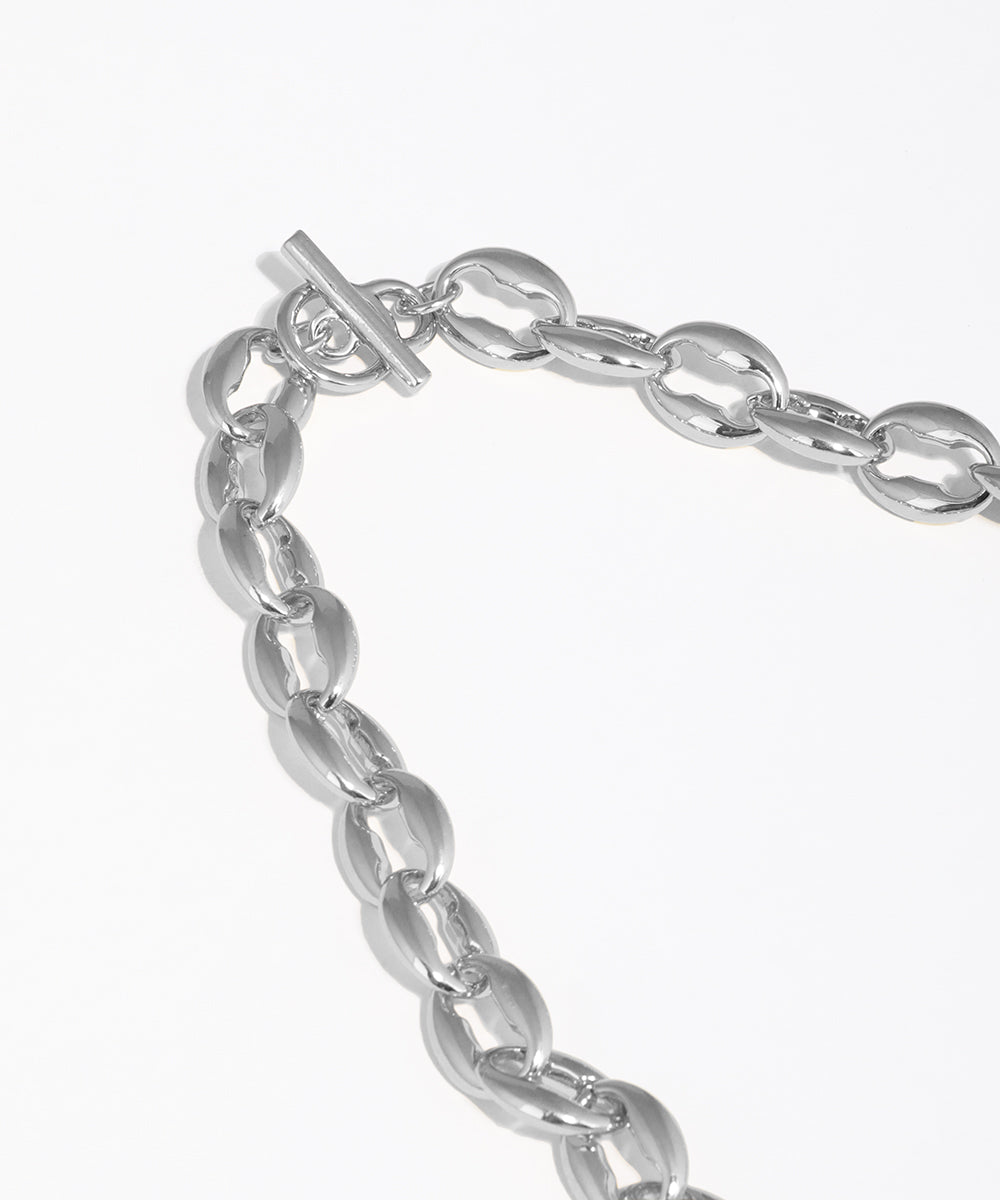 Silver chain bracelet on a white background