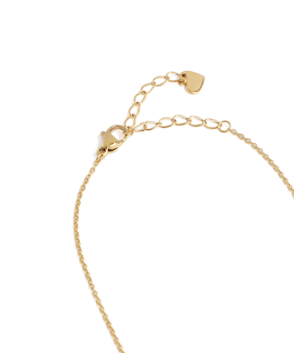 Gold bracelet on a white background