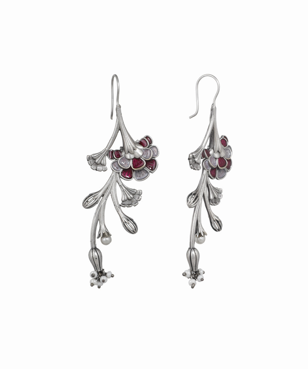 Oxidised silver-tone drop earrings with red and grey enamel floral design and small faux pearls