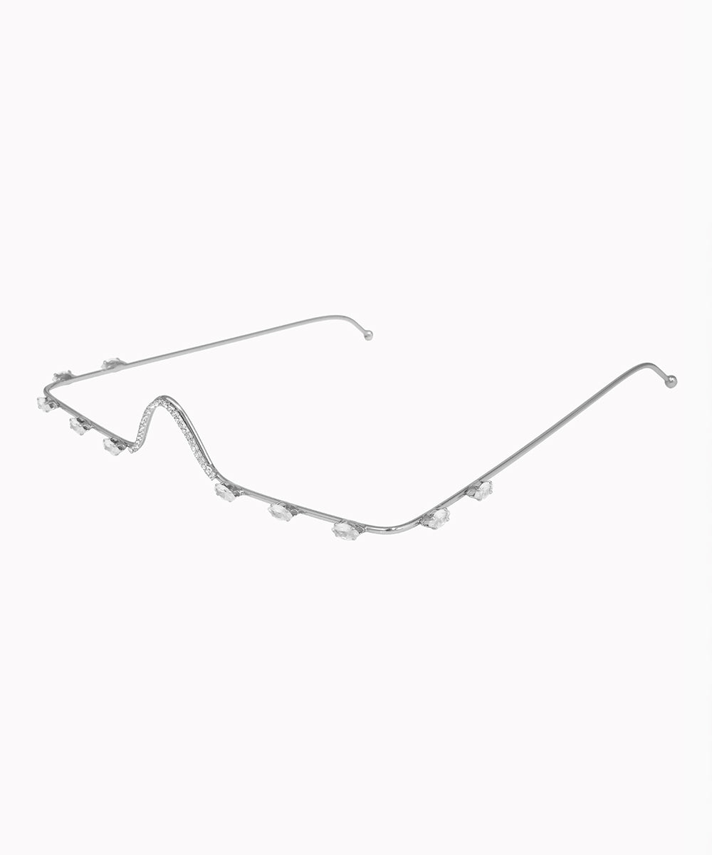 Silver eyeglass frame on a white background