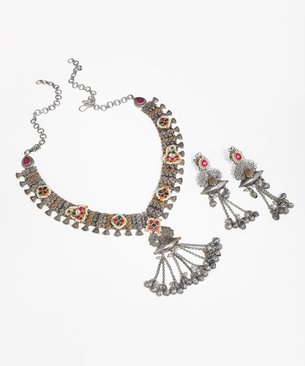 Oxidised necklace set with colorful stone inlay, gold-tone accents, and hanging bell details
