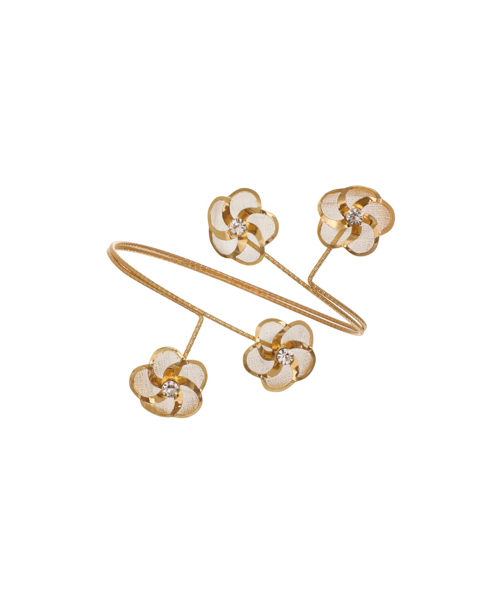 Gold-tone arm cuff with four mesh floral elements and clear CZ stones.