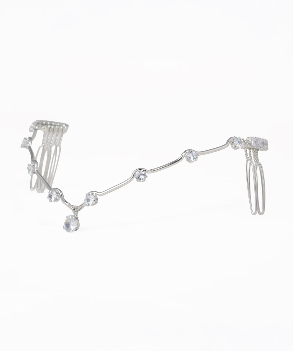 Silver-tone tiara with wavy design and scattered clear round and drop accents