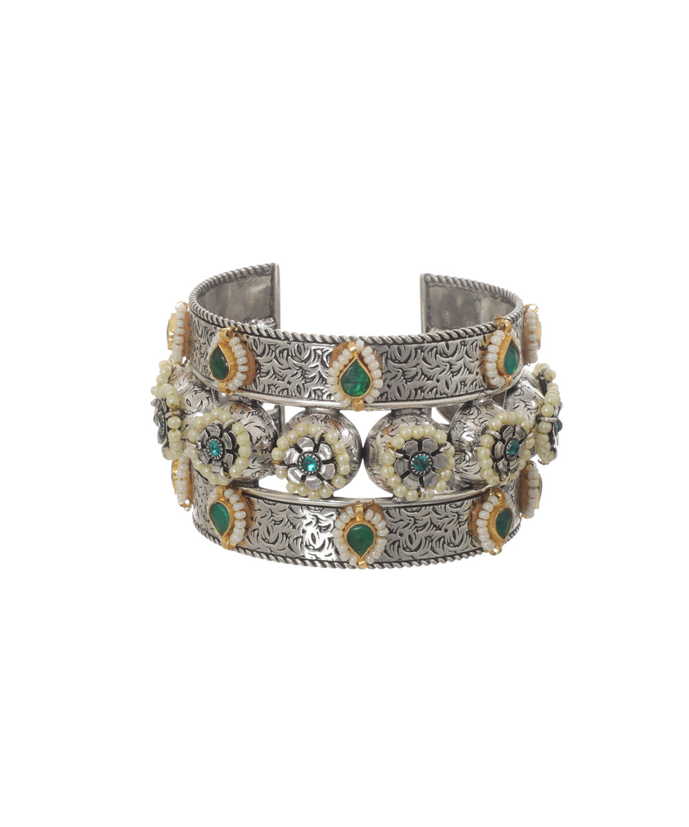 Oxidised silver-tone cuff bracelet with green stones and faux pearls