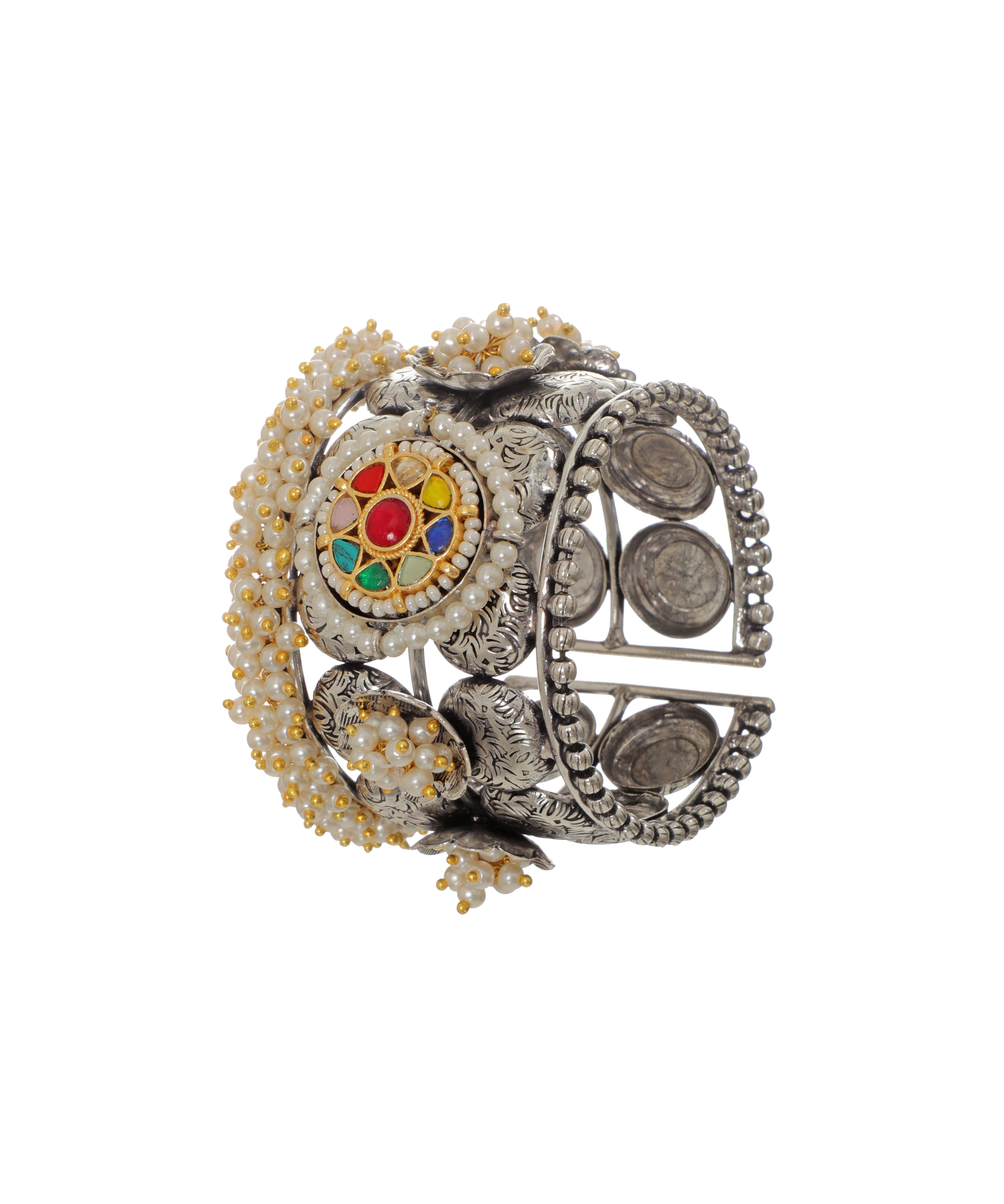 Oxidized silver-tone cuff bracelet with intricate floral design, multicolor stones, and faux pearl clusters.
