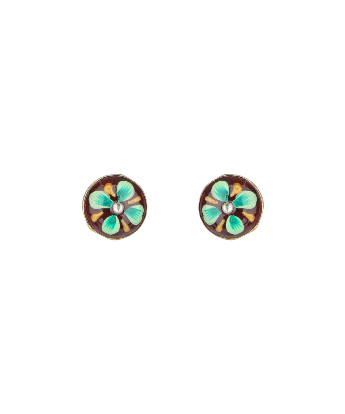 A pair of oval stud earrings with a vintage-style floral design. Each earring features a dark brown background with four light green and turquoise petals, a small white pearl-like center, and a gold-toned metal border.