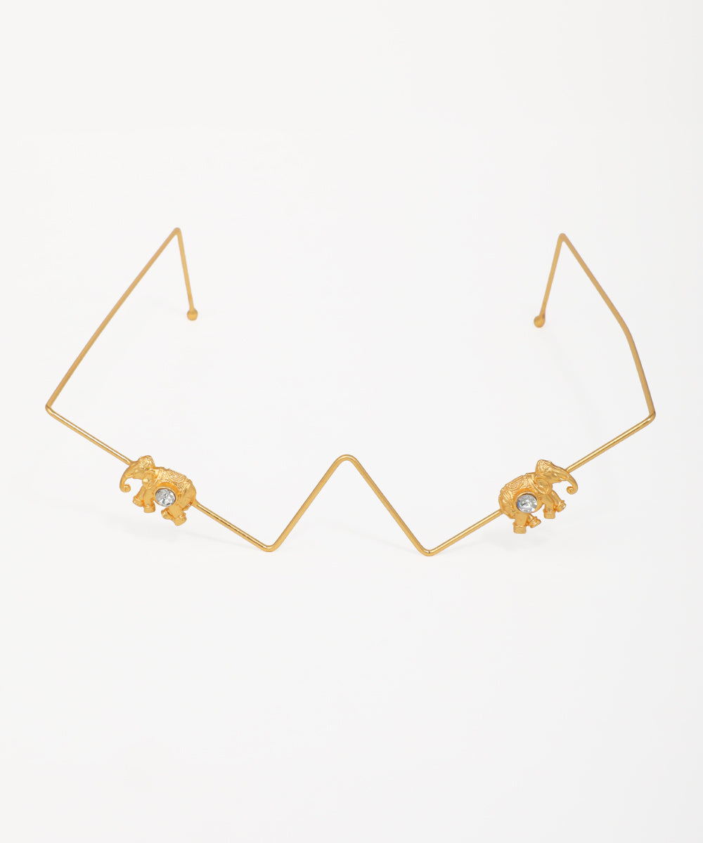 Gold-tone facelet with geometric wire and two elephant motifs, each with a clear stone accent