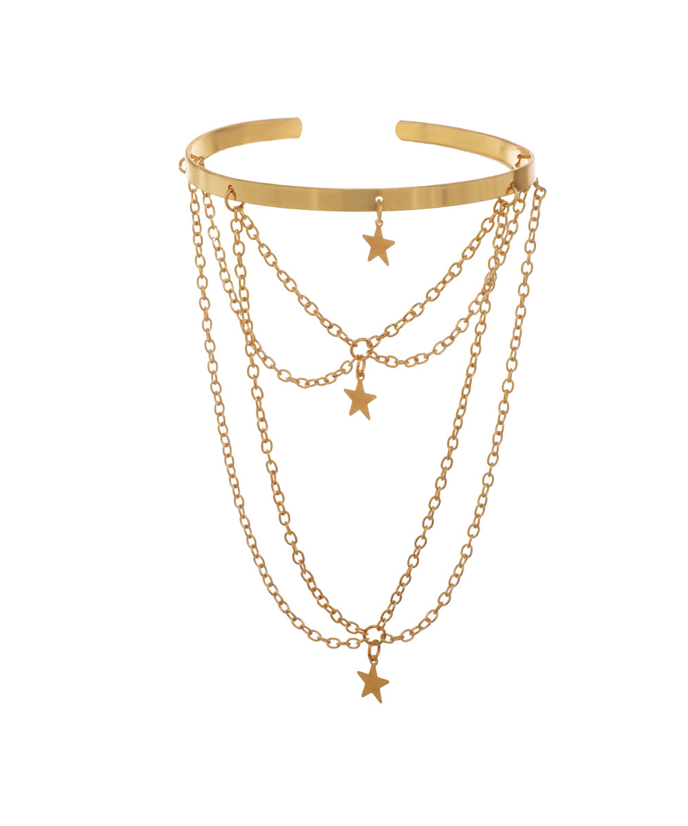 Gold-tone open arm cuff with cascading chains and small star charms