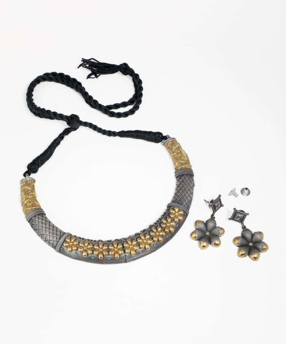 Oxidise silver-tone and gold-tone floral necklace set with matching drop earrings and textured finish