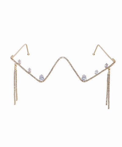Gold-tone facelet with wavy crystal-studded bar, pear drops, and crystal draped tassels.