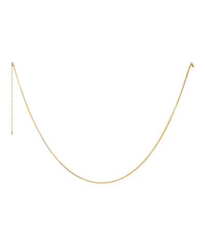 Gold-tone waist chain with a thin, flat snake chain design and adjustable extender