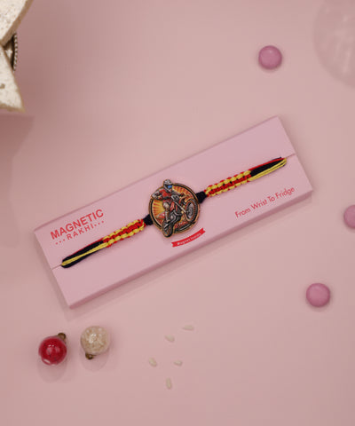 Multi-tone Rakhi band with motorcycle rider motif and braided thread