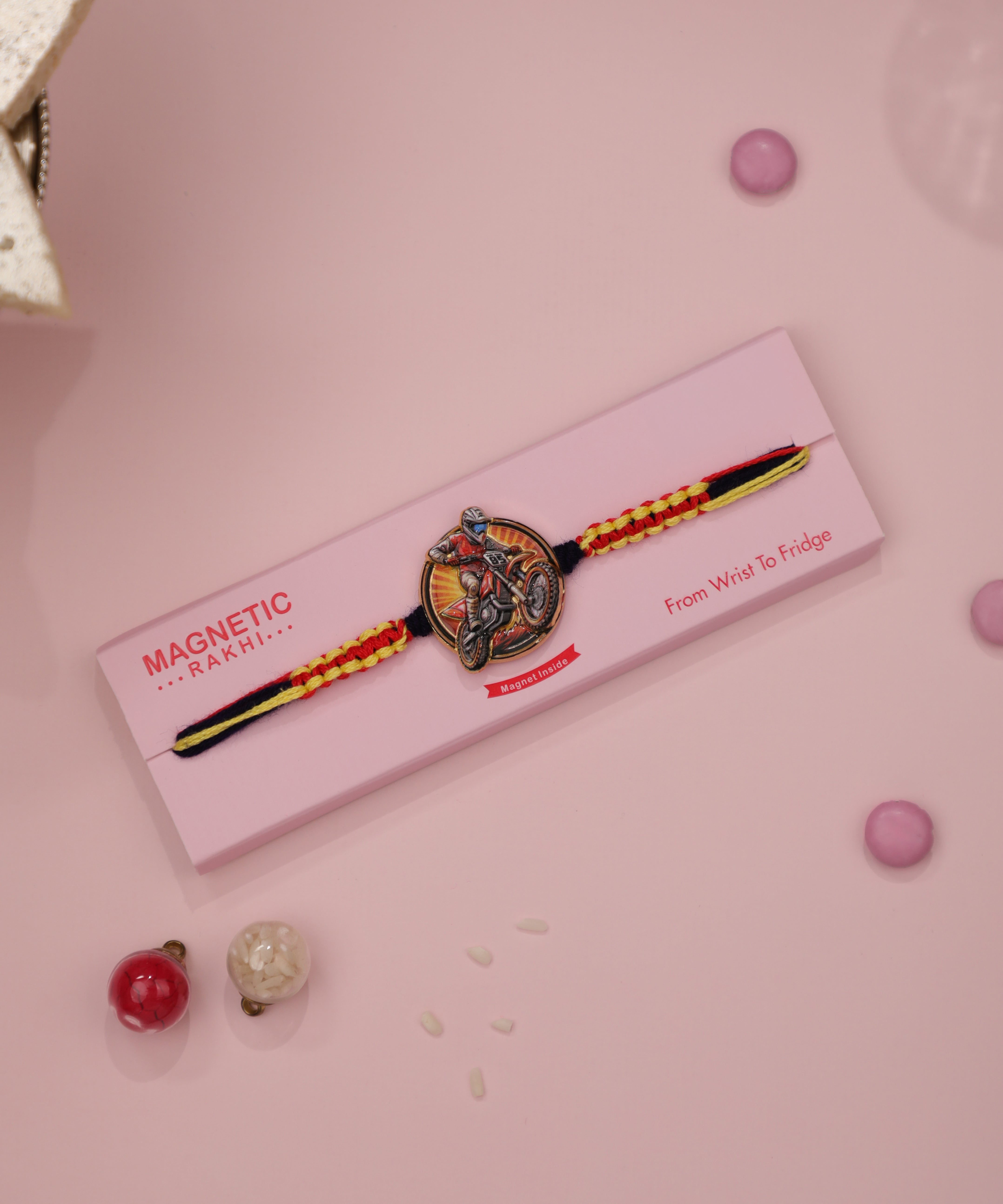 Multi-tone Rakhi band with motorcycle rider motif and braided thread