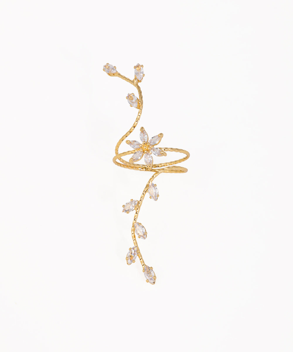 Gold-tone ring with textured vine design and marquise cut CZ stones forming flowers and leaves