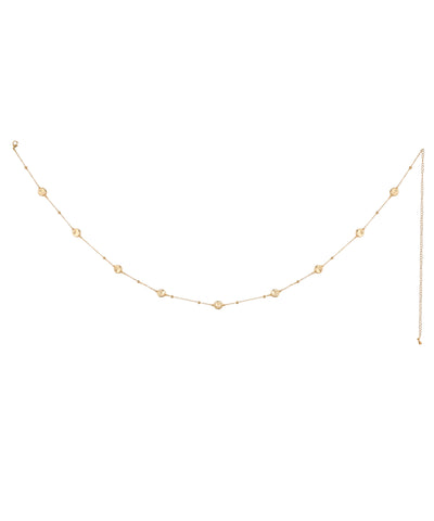 Gold-tone waist chain with delicate round disc stations and small metallic beads.