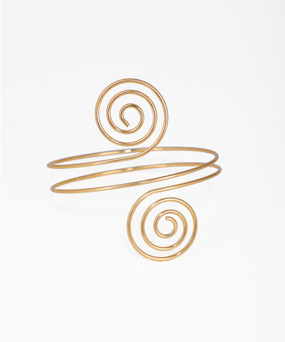 Gold-tone arm cuff with open spiral design at each end