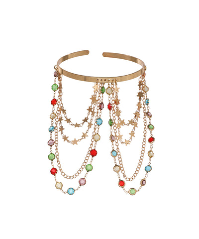 Gold-tone arm cuff with dangling chains, star charms, and multi-colored glass crystals