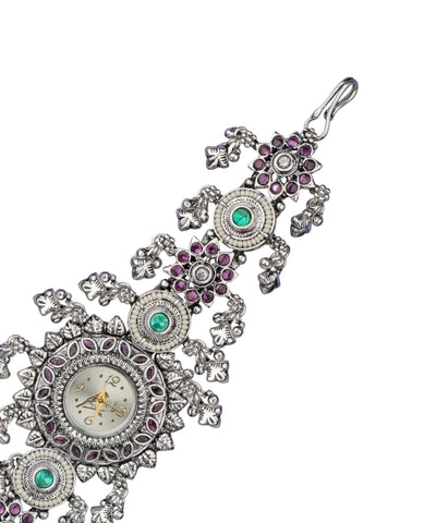 Bracelet watch featuring decorative stone and petal details